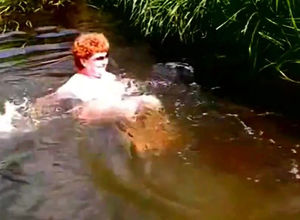 French grannie nudist swimming in the..