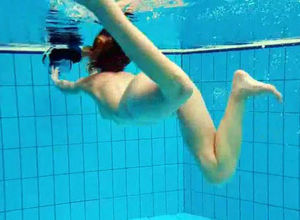 Porno shooting underwater. Bare Young..